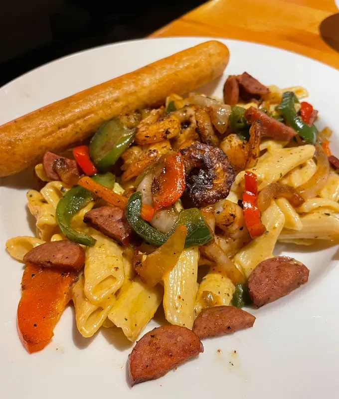 applebee’s big easy menu review: blackened shrimp and andouille sausage penne' fetchpriority='auto' title='Applebee’s Big Easy Menu Is Here for a Limited Time—But Is It Any Good? Here’s a Food Editor’s Review of Every Dish