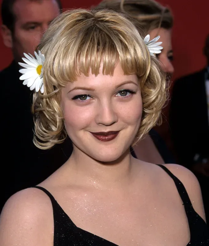 drew barrymore hair flower power' fetchpriority='auto' title='Drew Barrymore’s Hair Evolution—From Child Star to Talk Show Host