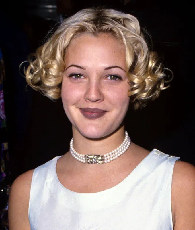 drew barrymore hair award show curls' fetchpriority='auto' title='Drew Barrymore’s Hair Evolution—From Child Star to Talk Show Host