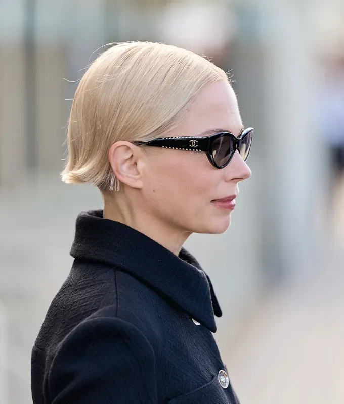 winter hair trends a photo of michelle williams rocking a micro bob' fetchpriority='auto' title='The 40 Best Short Haircuts for Women in 2025