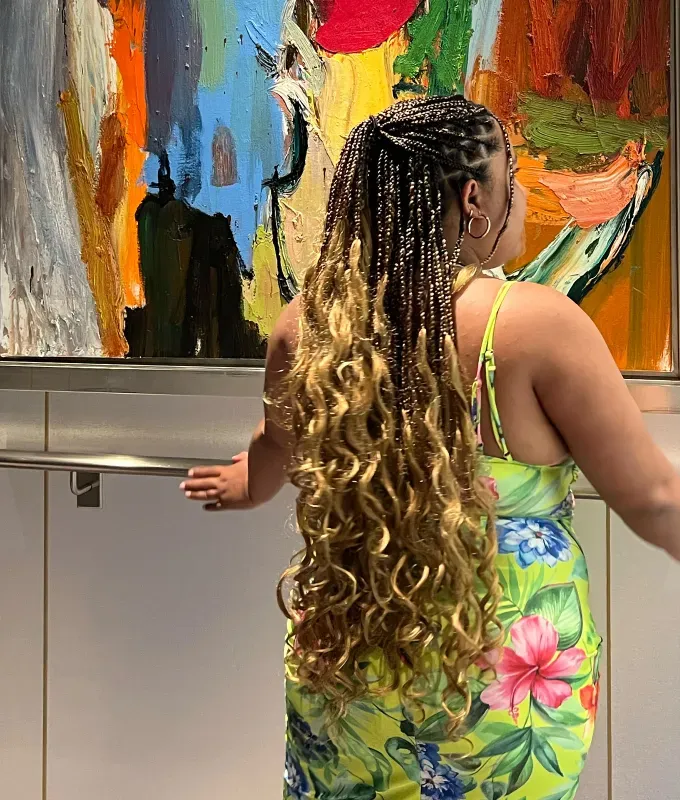 french curl braids a photo of chelsea candelario with half-up half-down look' fetchpriority='auto' title='I Got French Curl Braids aka the Protective Style That’s Going to Take Over This Summer