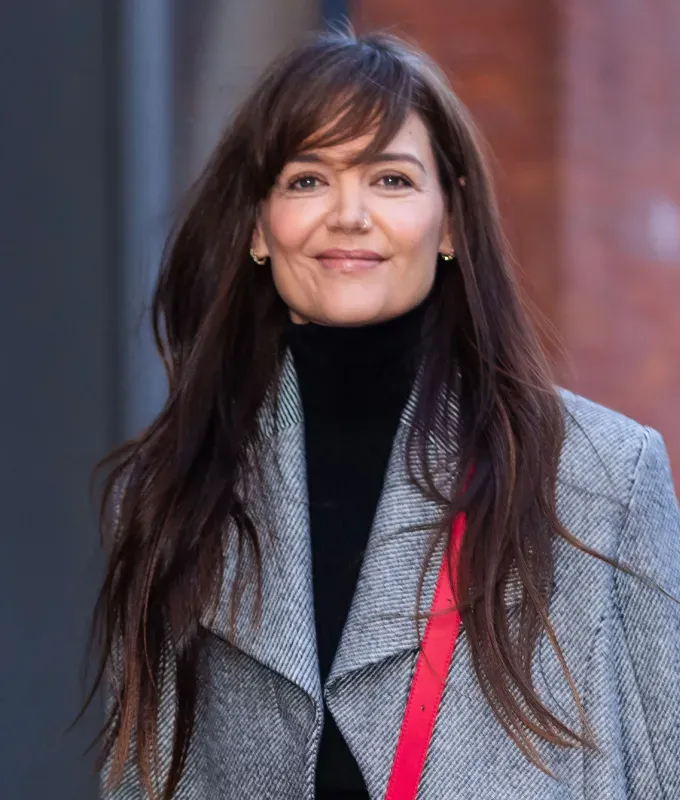celebrities with bangs katie holmes side bangs' fetchpriority='auto' title='From Taylor Swift to Zendaya Here Are 7 Celebrities with Bangs to Inspire Your Next Haircut