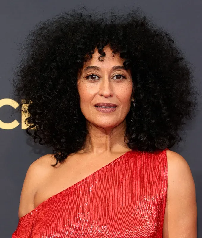 best haircuts for long faces full curls' fetchpriority='auto' title='The 14 Best Haircuts for Long Faces According to a Hairstylist