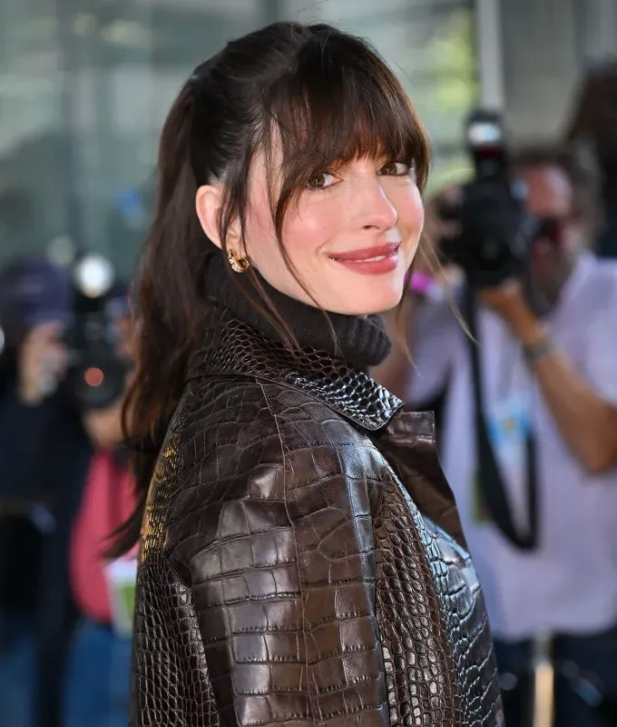 birkin bangs hair trend a photo of anne hathaway' fetchpriority='auto' title='Birkin Bangs Are the French-Girl Hair Trend You’ll Want to Try This Summer
