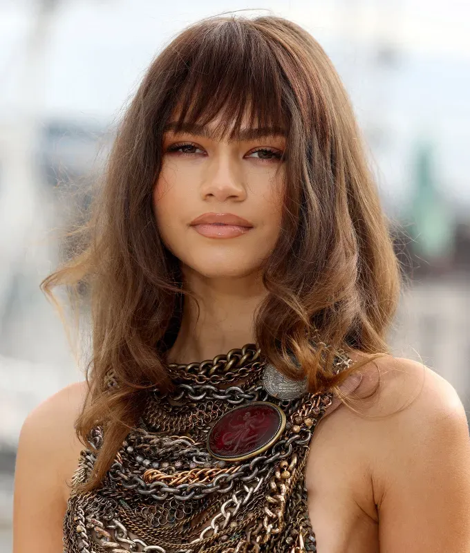birkin bangs trend zendaya' fetchpriority='auto' title='Birkin Bangs Are the French-Girl Hair Trend You’ll Want to Try This Summer