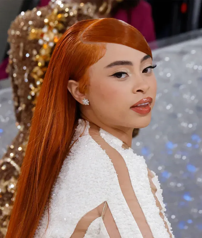 silk press hairstyles a photo of ice spice rocking a side bang' fetchpriority='auto' title='18 Silk Press Hairstyles to Elevate Your Silky Smooth Blowout