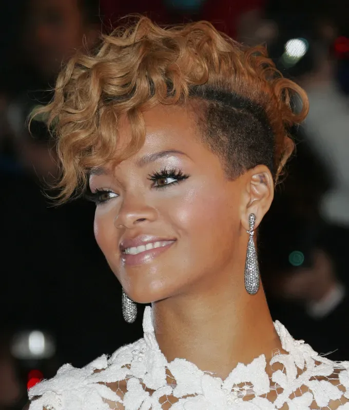 rihanna hairstyles curly mohawk' fetchpriority='auto' title='A Timeline of Rihanna’s Hairstyles From Pon De Replay to Fenty Beauty