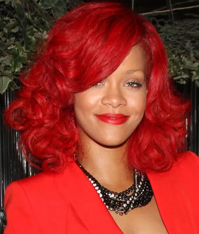 rihanna hairstyles siren curls' fetchpriority='auto' title='A Timeline of Rihanna’s Hairstyles From Pon De Replay to Fenty Beauty