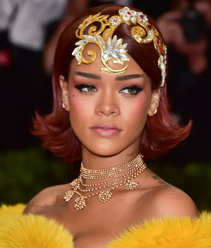 rihanna hairstyles flipped burgundy bob' fetchpriority='auto' title='A Timeline of Rihanna’s Hairstyles From Pon De Replay to Fenty Beauty
