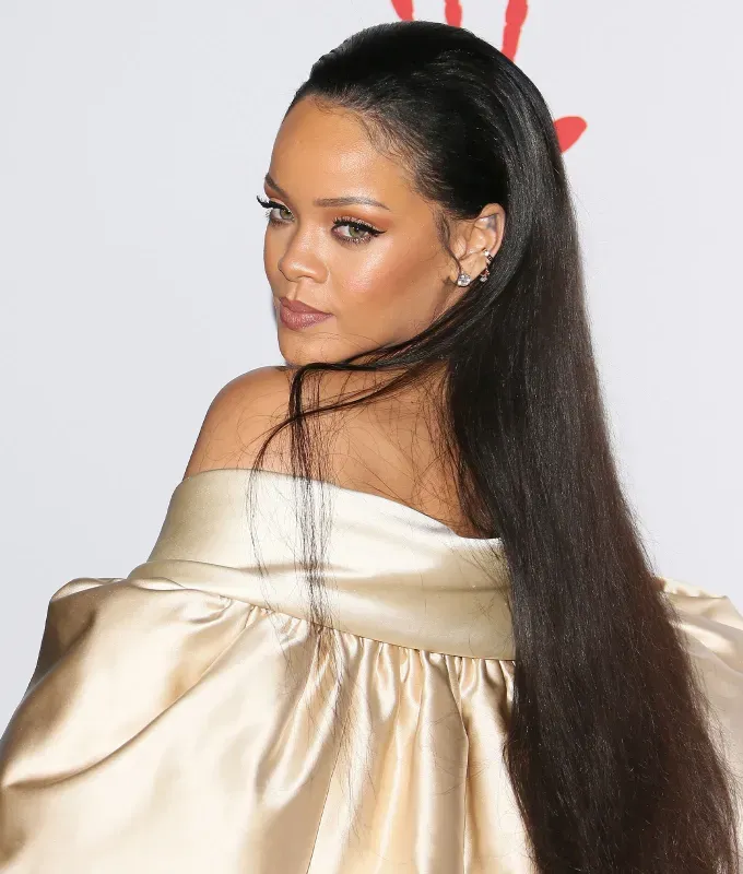 rihanna hairstyles slicked back' fetchpriority='auto' title='A Timeline of Rihanna’s Hairstyles From Pon De Replay to Fenty Beauty