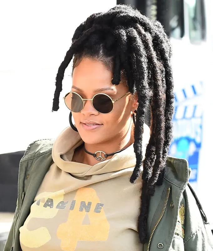 rihanna hairstyles locs' fetchpriority='auto' title='A Timeline of Rihanna’s Hairstyles From Pon De Replay to Fenty Beauty