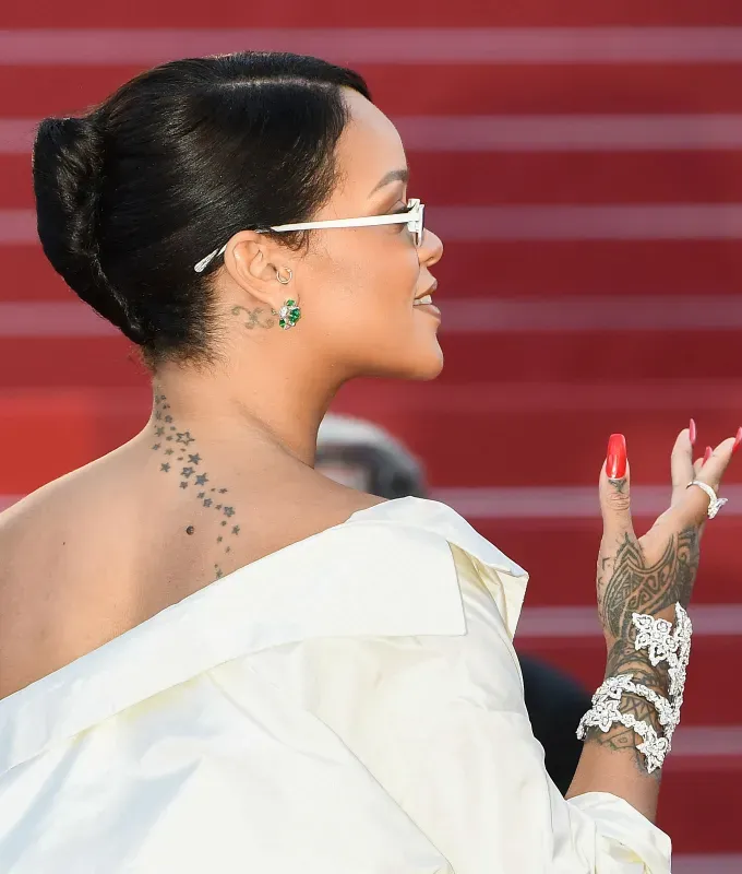rihanna hairstyles french twist' fetchpriority='auto' title='A Timeline of Rihanna’s Hairstyles From Pon De Replay to Fenty Beauty