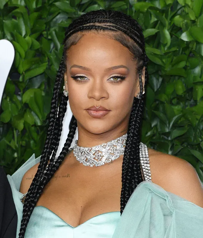 rihanna hairstyles fulani braids' fetchpriority='auto' title='A Timeline of Rihanna’s Hairstyles From Pon De Replay to Fenty Beauty
