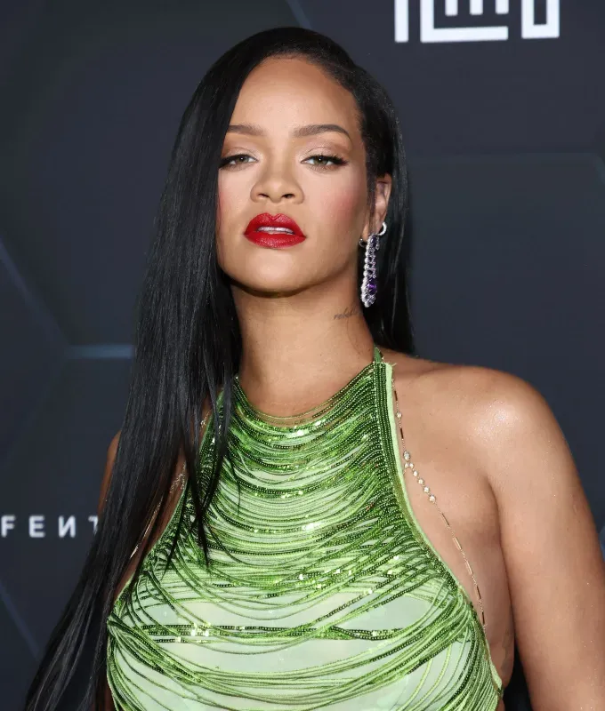rihanna hairstyles team side part' fetchpriority='auto' title='A Timeline of Rihanna’s Hairstyles From Pon De Replay to Fenty Beauty