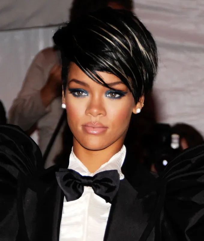 rihanna hairstyles blonde streaks' fetchpriority='auto' title='A Timeline of Rihanna’s Hairstyles From Pon De Replay to Fenty Beauty