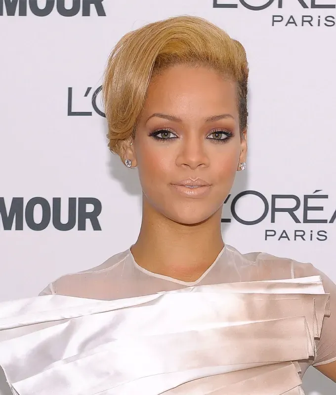 rihanna hairstyles blonde bombshell' fetchpriority='auto' title='A Timeline of Rihanna’s Hairstyles From Pon De Replay to Fenty Beauty