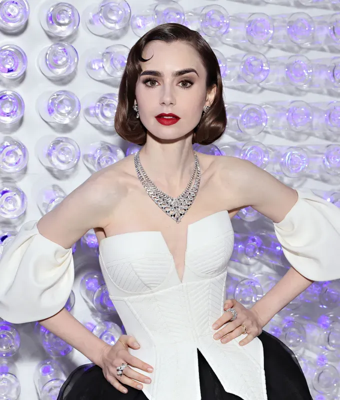 long bob haircut: Rounded Edges Long Bob lily collins' fetchpriority='auto' title='44 Long Bob Haircut Ideas for Any Face Shape According to Celeb Stylists