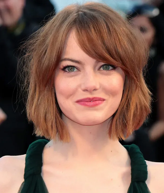 best haircuts for round faces wavy bob' fetchpriority='auto' title='The 36 Best Haircuts for Round Faces