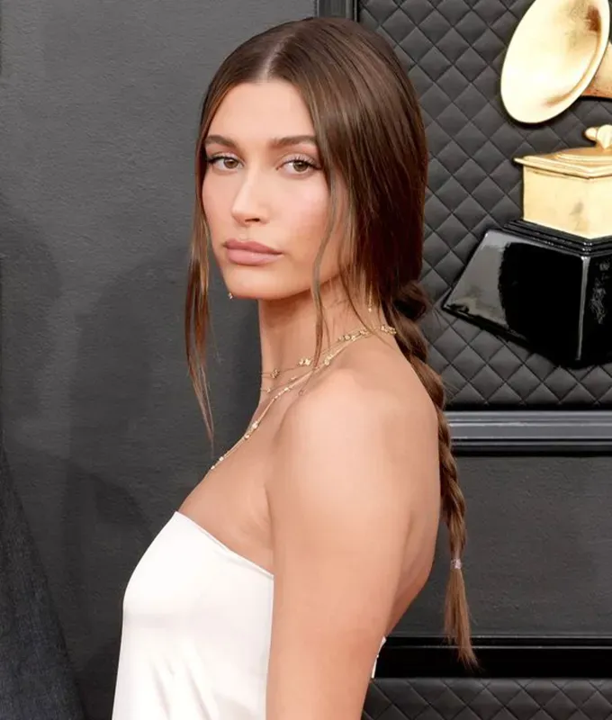 holiday hairstyles loose dutch braid hailey bieber' fetchpriority='auto' title='48 Holiday Hairstyles to Rock All Season Long from Voluminous Curls to Party Ponytails