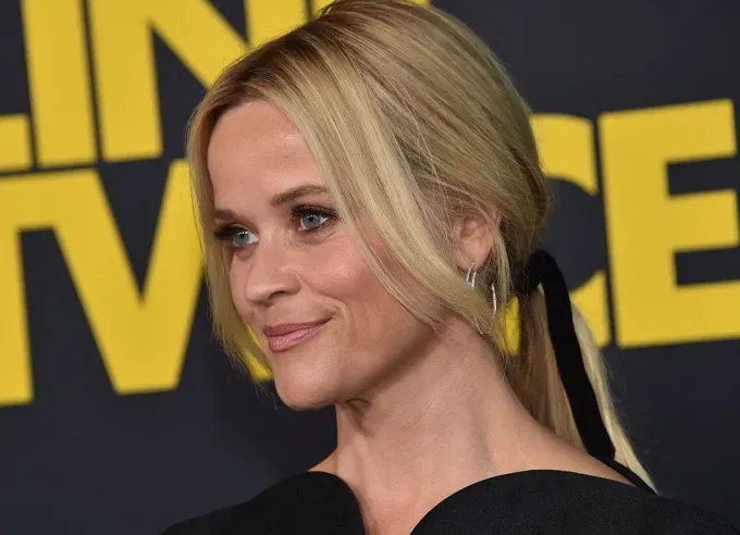 Reese Witherspoon ponytail hairstyle' fetchpriority='auto' title='Reese Witherspoon Hairstyles: From Brunette Curls to Pixie Haircuts