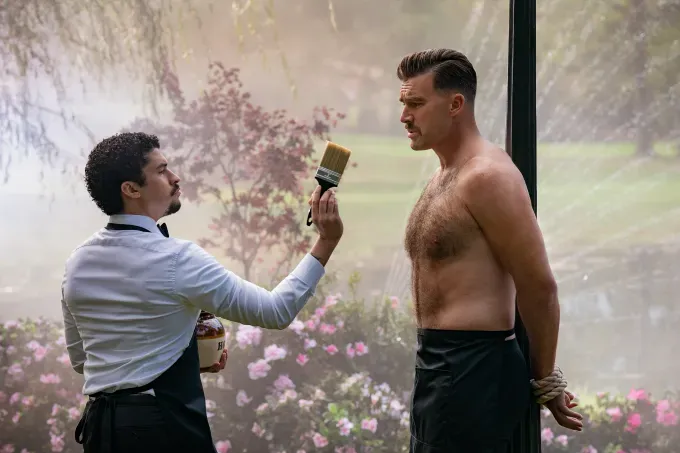 bad bunny and travis kelce in happy gilmore 2 with honey' fetchpriority='auto' title='Travis Kelce’s Shirtless Honey Scene with Bad Bunny Stole the Show in ‘Happy Gilmore 2’