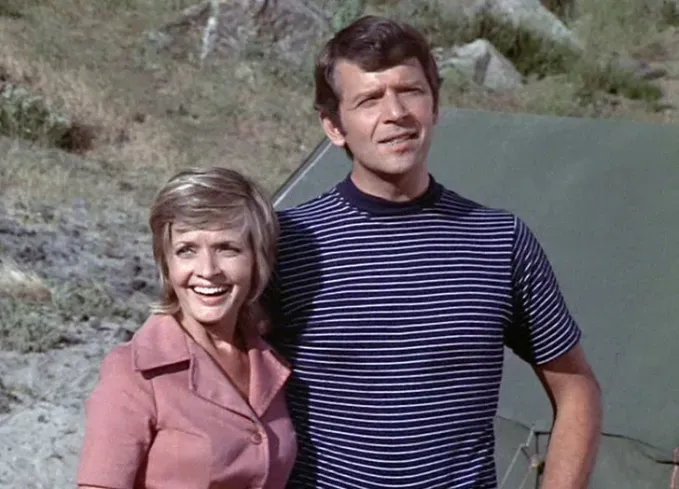 best tv couples carol and mike' fetchpriority='auto' title='The 55 Best TV Couples of All Time Including ‘Stranger Things’ ‘The Office’ & More