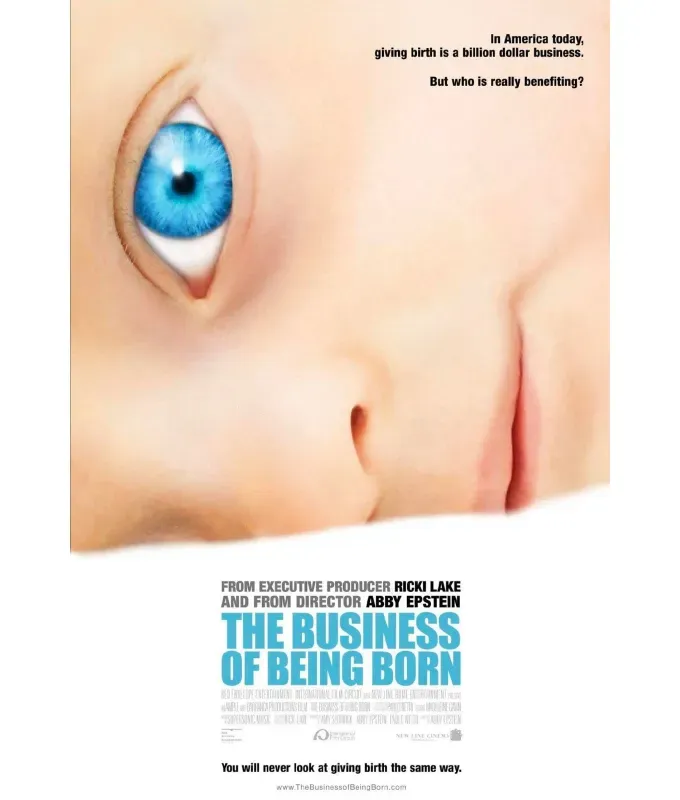 Movies About Pregnancy - A movie poster for The Business of Being Born featuring the head of a white baby with bright blue eyes laying on it’s side snuggled against a piece of white fabric.' fetchpriority='auto' title='25 Movies About Pregnancy That Will Make You Laugh Cry and Give You All the Feels (And Not Because of Hormones)