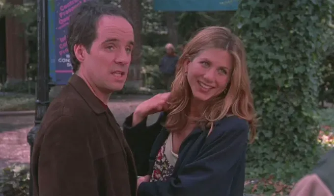 Movies About Pregnancy - Jennifer Anniston and her co-star stare over their shoulders while talking to someone behind them.' fetchpriority='auto' title='25 Movies About Pregnancy That Will Make You Laugh Cry and Give You All the Feels (And Not Because of Hormones)