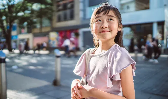 italian bellissima baby girl names a girl looking at the sky.' fetchpriority='auto' title='75 Bellissima Italian Baby Girl Names