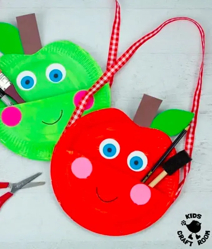 back to school crafts: Back to School red and green Paper Plate Apple Bags' title='40 Back-to-School Crafts for Kids to Combat First Day Butterflies