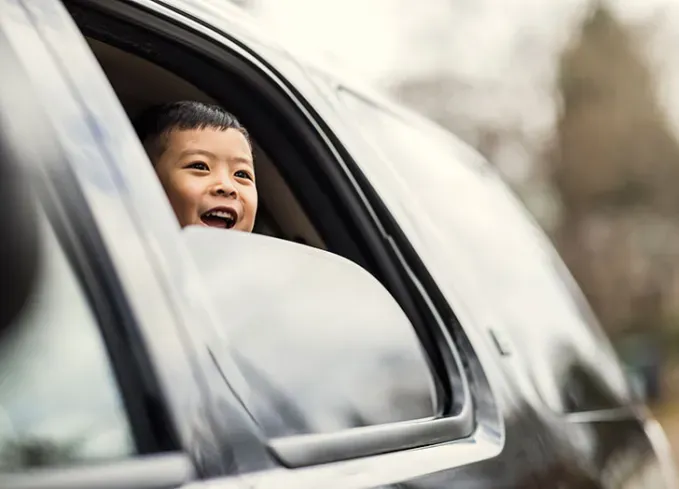 things to do on a long car ride kid looking out window' fetchpriority='auto' title='15 Fun Things to Do on a Road Trip to Keep Everyone Entertained