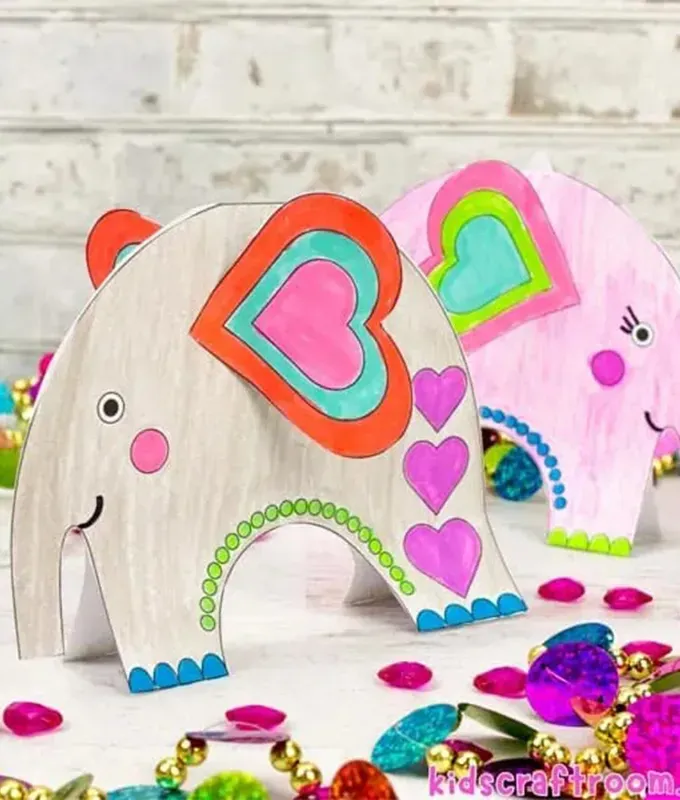 paper elephants with heart ears.' title='70 Fun and Easy Valentine’s Day Crafts for Kids