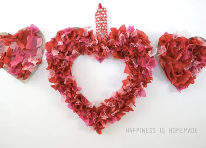 52 Fun and Easy Valentine’s Day Crafts for Kids - Tissue paper wreaths and crafts in the shape of hearts. They feature red and pink tissue paper.' title='70 Fun and Easy Valentine’s Day Crafts for Kids