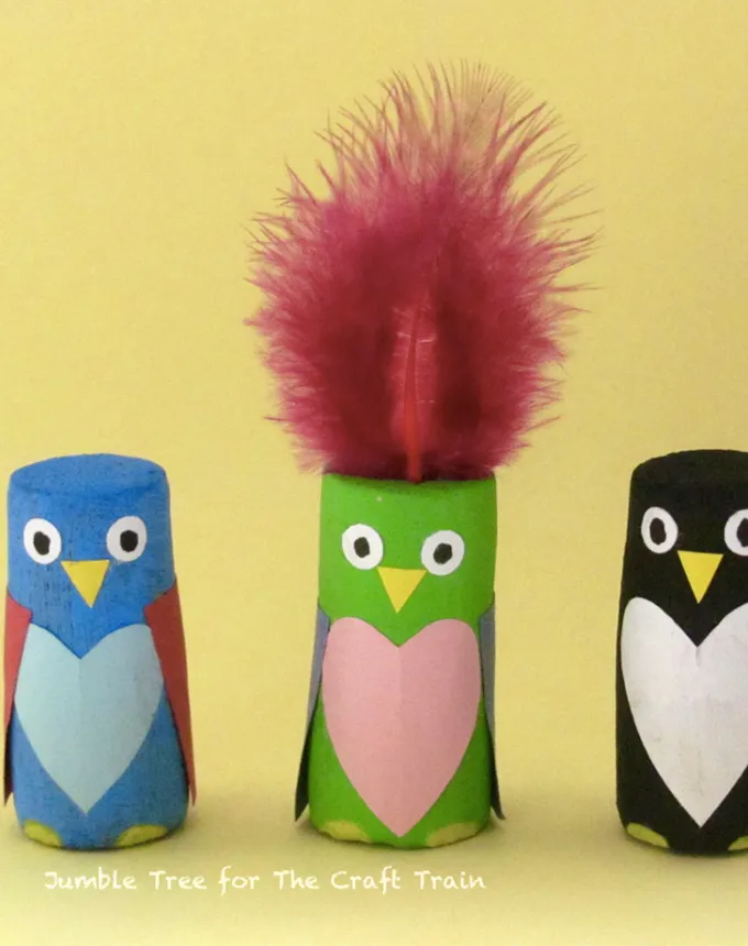 52 Fun and Easy Valentine’s Day Crafts for Kids - Wine corks painted to resemble birds with heart shaped chests faces and feather plumes.' title='70 Fun and Easy Valentine’s Day Crafts for Kids