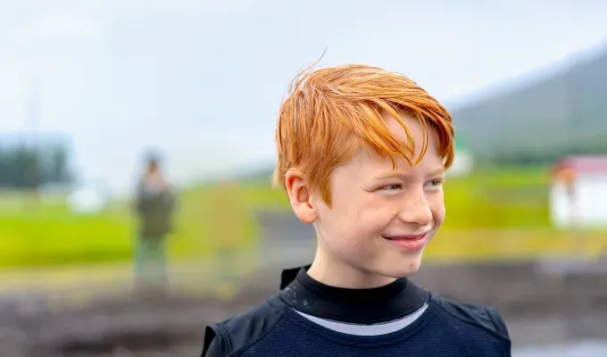 A boy with a mystical and magical baby name looks into middle distance.' fetchpriority='auto' title='50 Mystical and Magical Baby Names That Will Put You Under a Spell