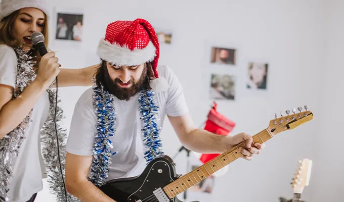 fun-things-to-do-on-christmas-guitar-karaoke' fetchpriority='auto' title='23 Fun Things to Do on Christmas Day in 2024