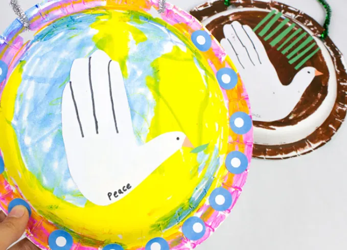 7 handprint christmas peace dove christmas crafts for toddlers' title='35 Christmas Crafts for Toddlers That They Can Actually Do