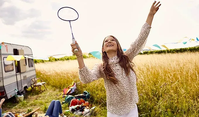 Teen trends to watch for in 2024: girl playing badminton outside' fetchpriority='auto' title='From Badminton to Wrinkle Reduction These 9 Trends Will be Huge For Teens in 2024