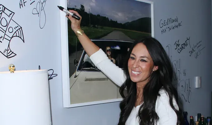 Gen X characteristics: Joanna Gaines writing on the wall' fetchpriority='auto' title='11 Gen X Traits You’ll Totally Recognize If You Grew Up With No Internet and No One Checking On You