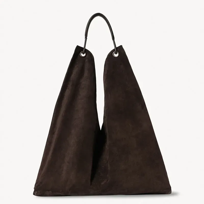 brands like eileen fisher the row bindle bag' title='17 Brands Like Eileen Fisher to Shop for Timeless Elevated Basics