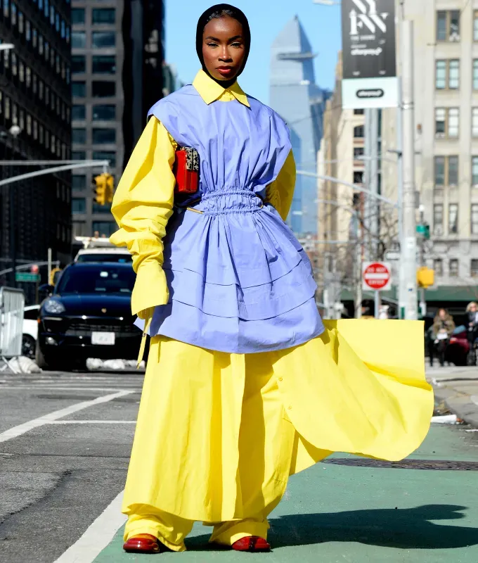 a woman wearing yellow blue and red' fetchpriority='auto' title='I’m a Veteran Fashion Editor and These Are the Best Styling Tips I’ve Learned On the Job