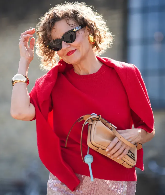 renata wearing a red sweater' fetchpriority='auto' title='I’m a Veteran Fashion Editor and These Are the Best Styling Tips I’ve Learned On the Job