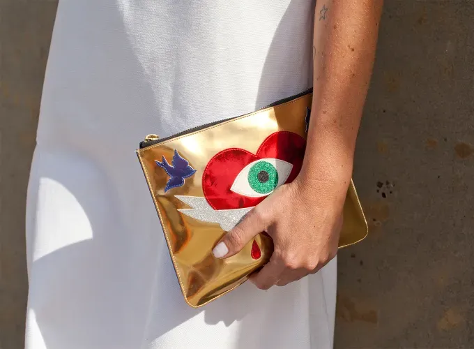 charlotte olympia clutch bag' fetchpriority='auto' title='I’m a Veteran Fashion Editor and These Are the Best Styling Tips I’ve Learned On the Job
