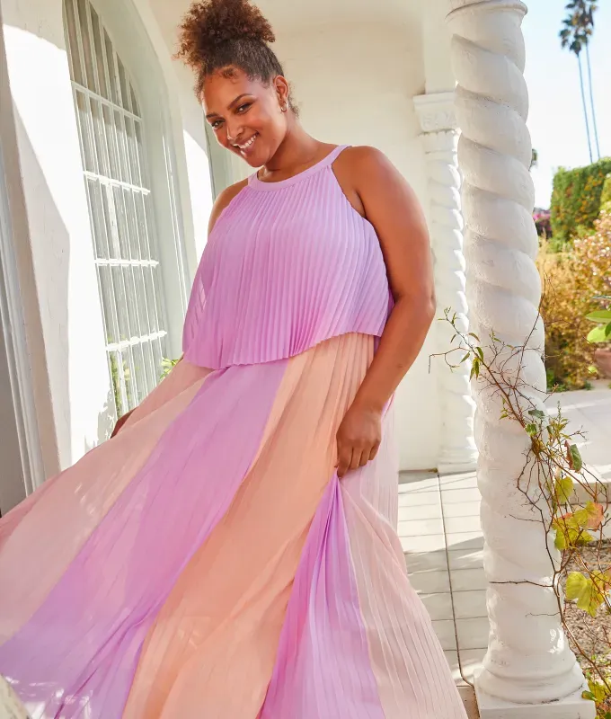 Stores Like Lulus: woman wearing a lilac and orange flowy dress from Skies Are Blue' title='20 Stores Like Lulus to Shop Right Now