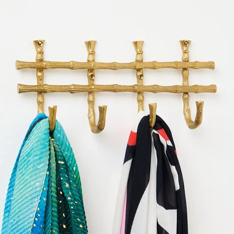 oliver bonas gold bamboo towel rack' title='20 Stores Like Anthropologie to Shop Right Now