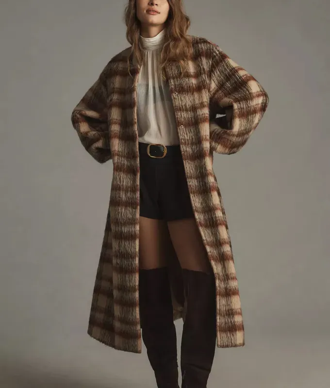 dra coat frazzled english woman trend' title='‘Frazzled English Woman’ Is the Only Aesthetic I Want to Wear This Winter. Here’s Exactly How to Get the Look