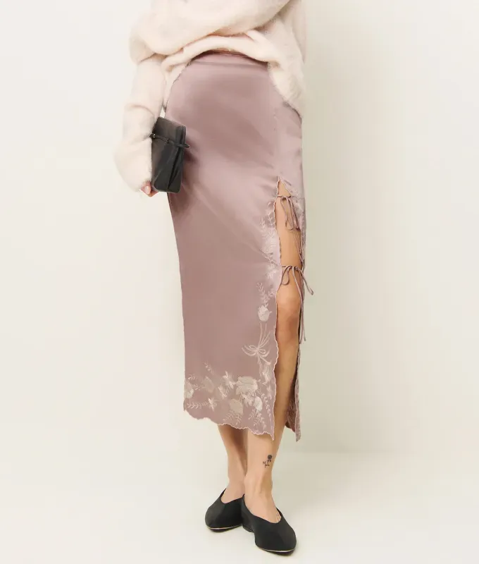 reformation slip skirt frazzled english woman trend' title='‘Frazzled English Woman’ Is the Only Aesthetic I Want to Wear This Winter. Here’s Exactly How to Get the Look