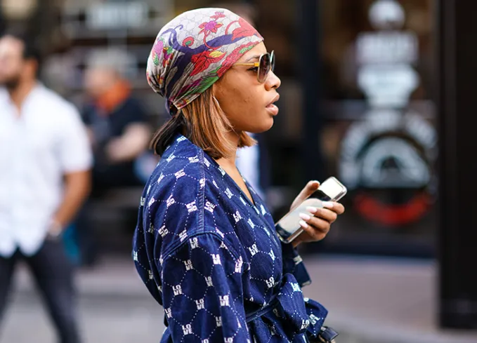 woman wearing a bandana cap head scarf style' fetchpriority='auto' title='13 Head Scarf Styles for Bad Hair Days and Beyond