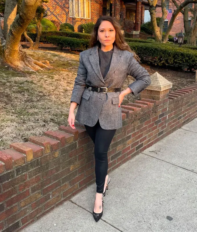 oversized-clothing-tips-for-petite-women: Petite editor Stephanie Maida wearing a belted jacket' fetchpriority='auto' title='I Asked 2 Petite Fashion Experts How to Wear an Oversized Blazer as a Short Girl—Here Are My Results