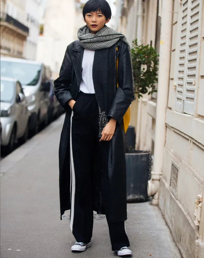 woman wearing black and white' fetchpriority='auto' title='31 Outfit Ideas for a Sparkly Stylish and Rather Festive December